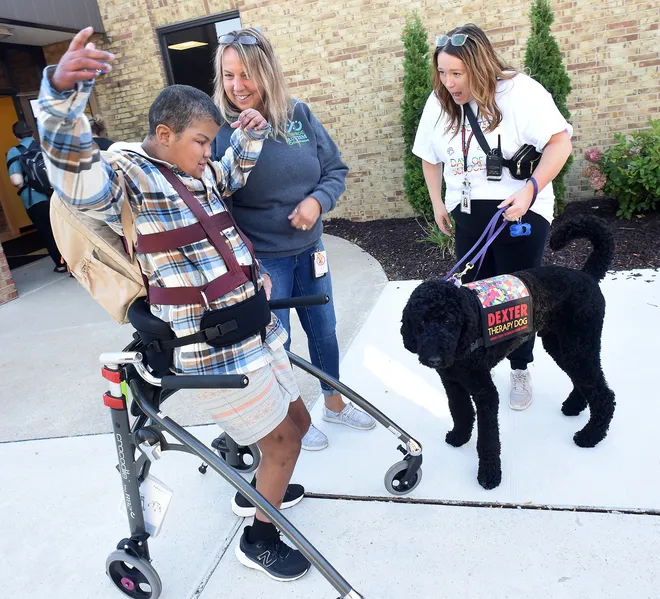 Monroe in Pictures: Dexter the therapy dog goes to school